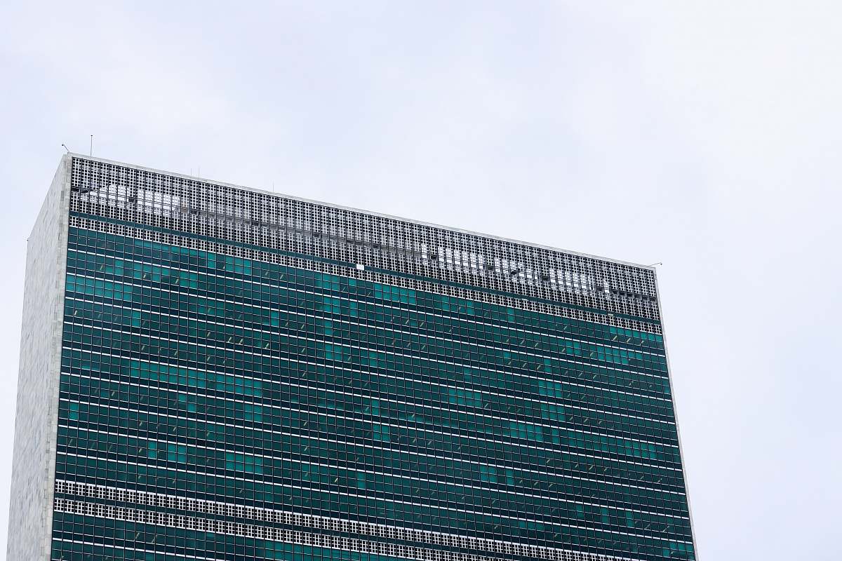 office building green and gray glass building grey